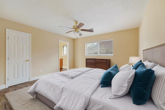 bedroom featuring ceiling fan and hardwood / wood-style floors