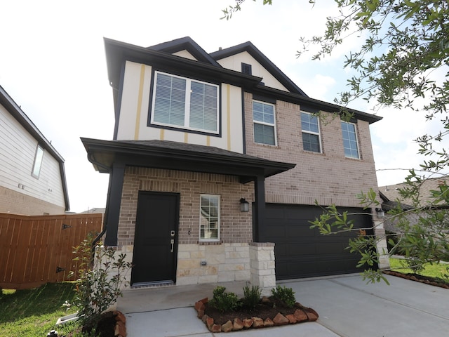 8026 Kay Harbor Dr, Cypress, TX 77433 - view of front of home with an attached garage, driveway, brick siding, and stone siding