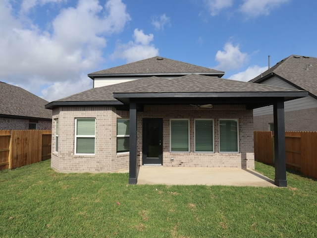 8026 Kay Harbor Dr, Cypress, TX 77433 - rear view of property with brick siding, roof with shingles, and a patio