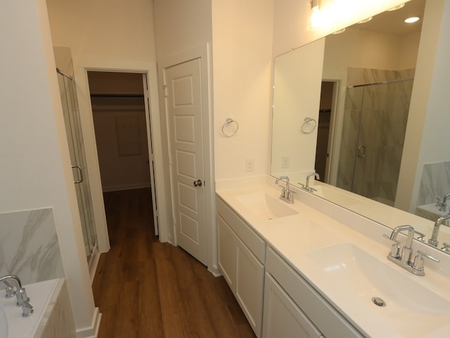 8026 Kay Harbor Dr, Cypress, TX 77433 - bathroom with a stall shower, a garden tub, and double vanity