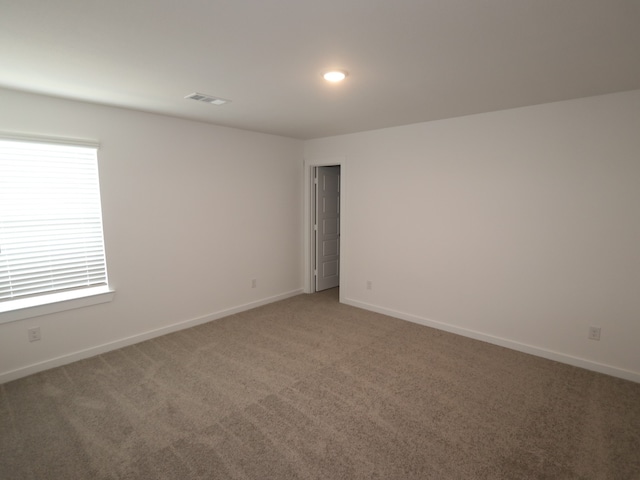 8026 Kay Harbor Dr, Cypress, TX 77433 - unfurnished room with light carpet and baseboards