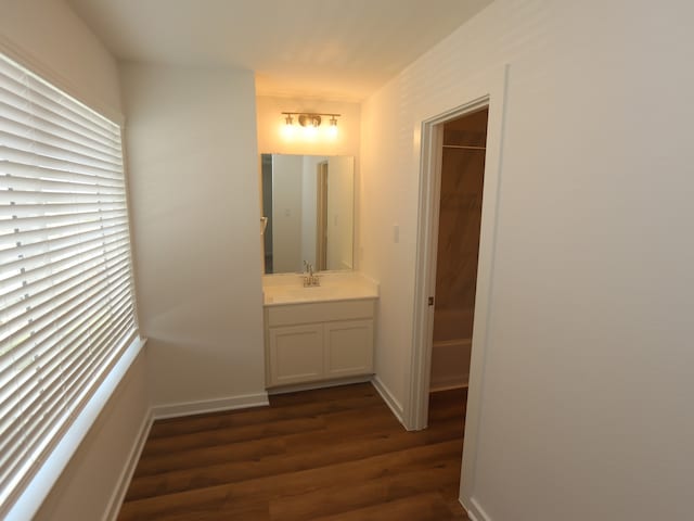 8026 Kay Harbor Dr, Cypress, TX 77433 - bathroom with wood finished floors and vanity