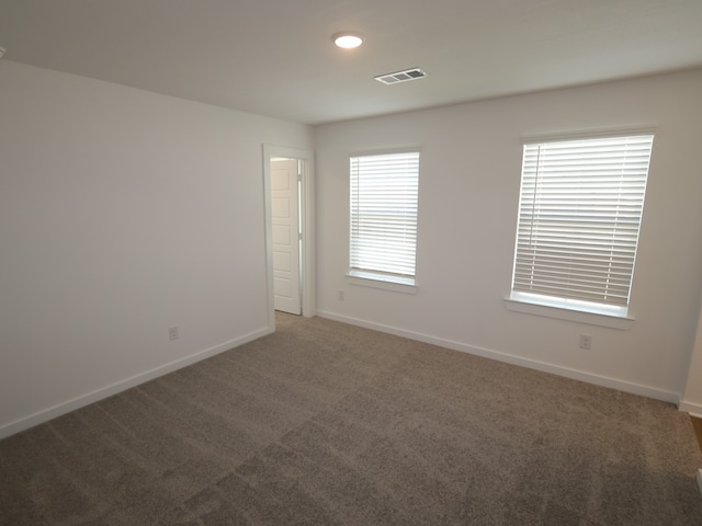 8026 Kay Harbor Dr, Cypress, TX 77433 - empty room with light colored carpet, baseboards, and recessed lighting