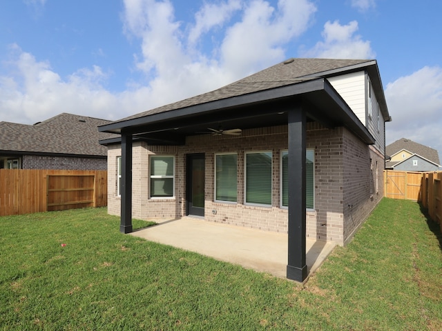 8026 Kay Harbor Dr, Cypress, TX 77433 - rear view of property with brick siding, a ceiling fan, a patio area, and a shingled roof