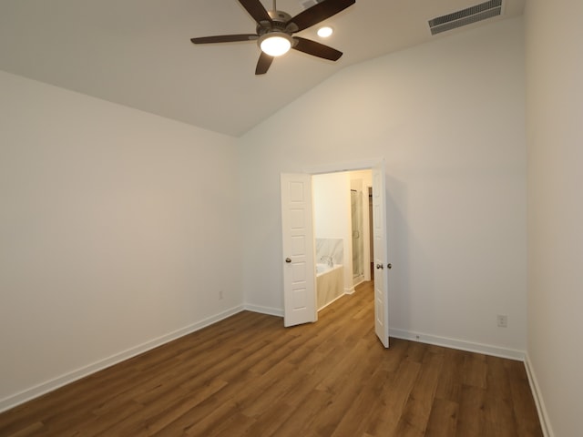 8026 Kay Harbor Dr, Cypress, TX 77433 - unfurnished room featuring ceiling fan, baseboards, dark wood-style flooring, and high vaulted ceiling