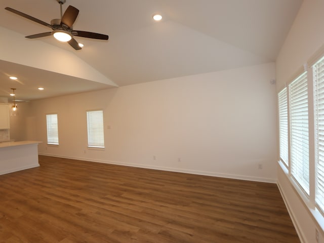 8026 Kay Harbor Dr, Cypress, TX 77433 - unfurnished living room with lofted ceiling, dark wood-type flooring, ceiling fan, healthy amount of natural light, and recessed lighting