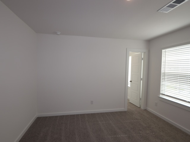 8026 Kay Harbor Dr, Cypress, TX 77433 - spare room with carpet floors, baseboards, and a smoke detector