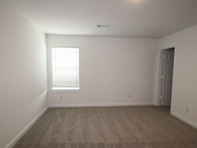 8026 Kay Harbor Dr, Cypress, TX 77433 - carpeted spare room with baseboards
