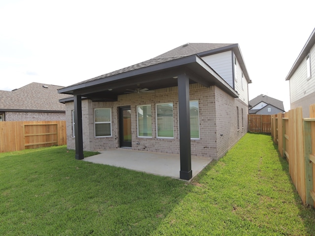 8026 Kay Harbor Dr, Cypress, TX 77433 - rear view of property with brick siding, ceiling fan, a patio area, and roof with shingles
