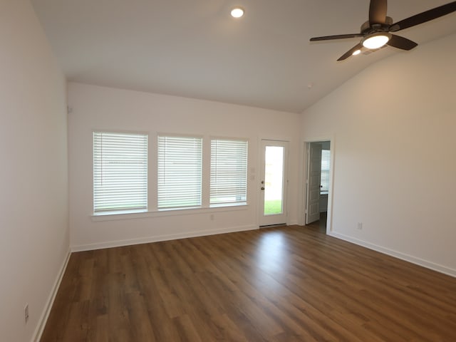 8026 Kay Harbor Dr, Cypress, TX 77433 - spare room with vaulted ceiling, baseboards, dark wood finished floors, a ceiling fan, and recessed lighting