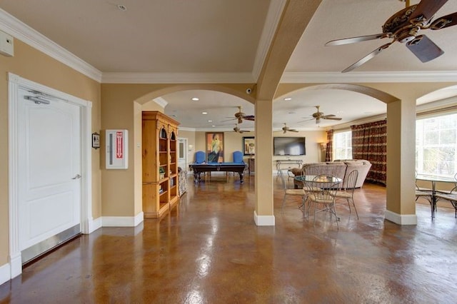 interior space with crown molding, billiards, concrete floors, and ceiling fan