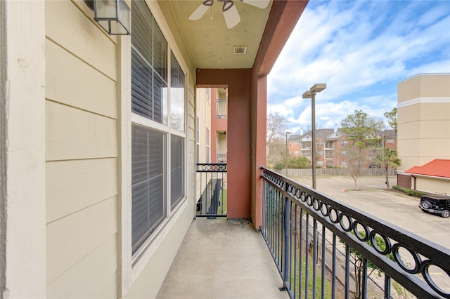 balcony featuring ceiling fan