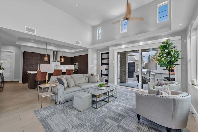 living room with a high ceiling