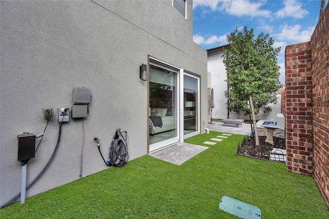 view of yard with a patio area