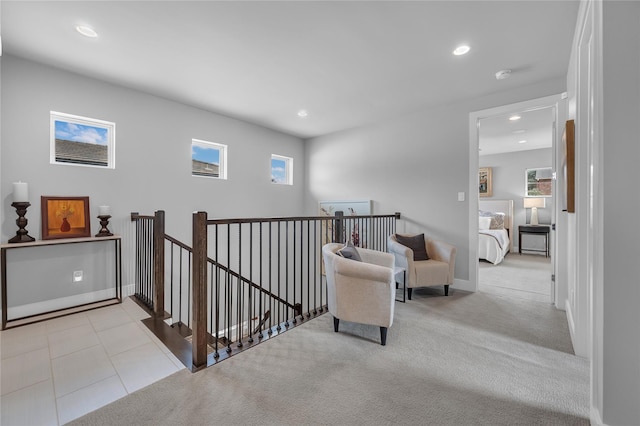 sitting room with light colored carpet