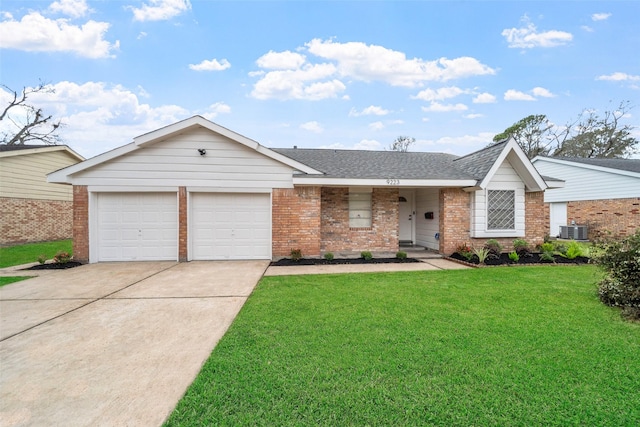 ranch-style house with a garage, a shingled roof, brick siding, concrete driveway, and a front lawn