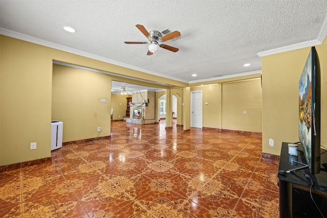 unfurnished living room with ceiling fan, crown molding, and a textured ceiling