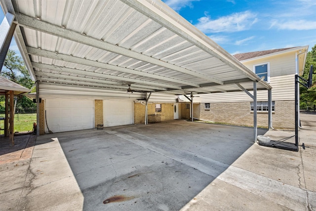 garage featuring a carport