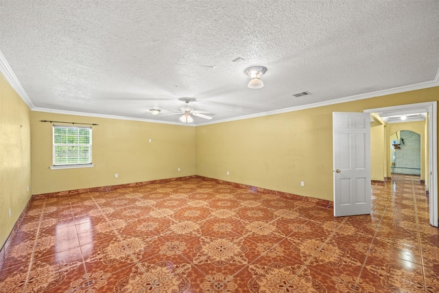 spare room featuring crown molding, ceiling fan, and a textured ceiling