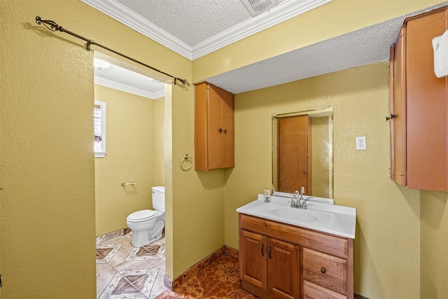 bathroom featuring ornamental molding, vanity, a textured ceiling, and toilet