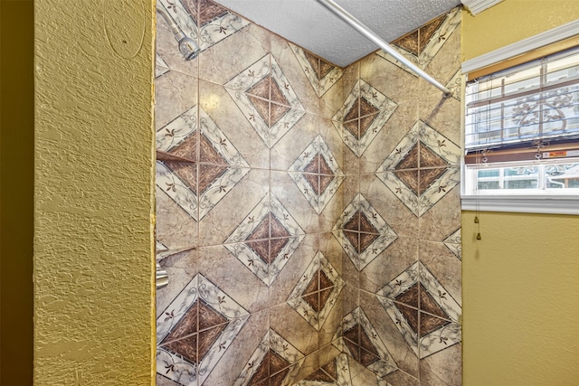 bathroom with a textured ceiling