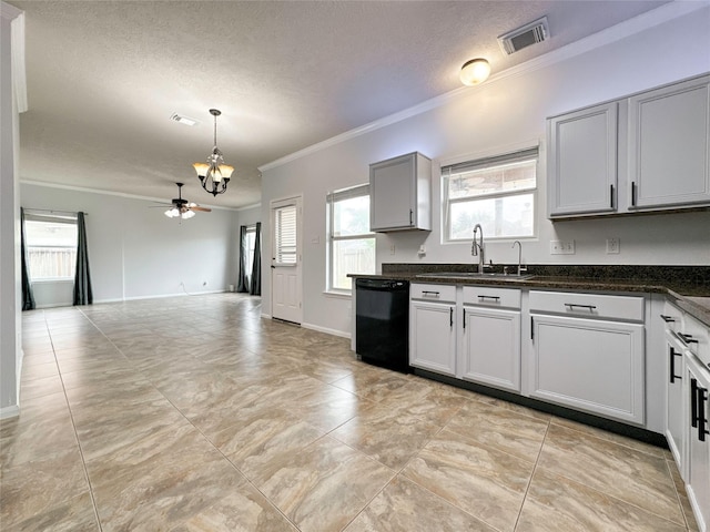 kitchen with sink, dishwasher, plenty of natural light, ornamental molding, and decorative light fixtures