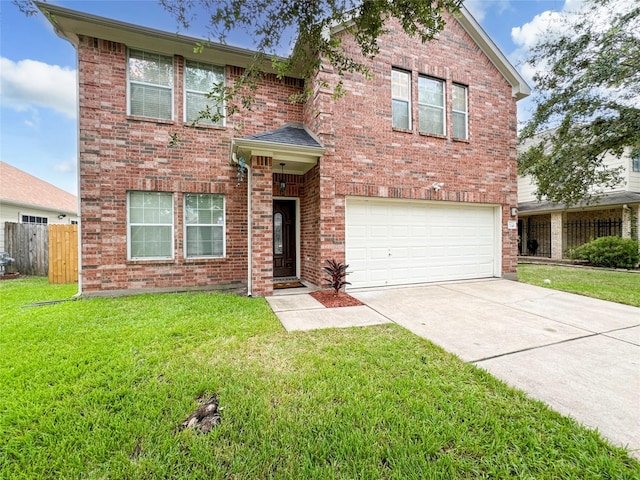 view of property with a garage and a front yard