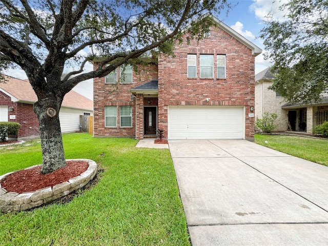 view of front of property featuring a garage and a front lawn