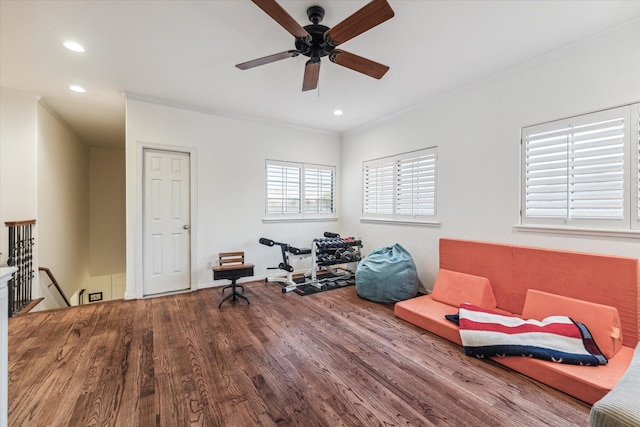 miscellaneous room featuring crown molding, recessed lighting, ceiling fan, an upstairs landing, and wood finished floors