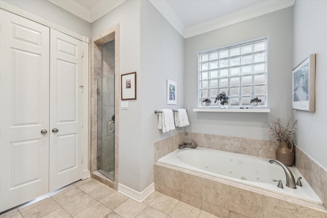 bathroom featuring baseboards, tile patterned floors, a whirlpool tub, a stall shower, and crown molding