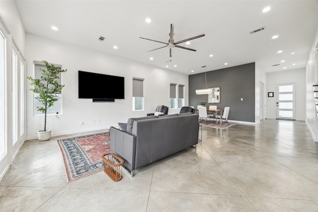 living room featuring ceiling fan