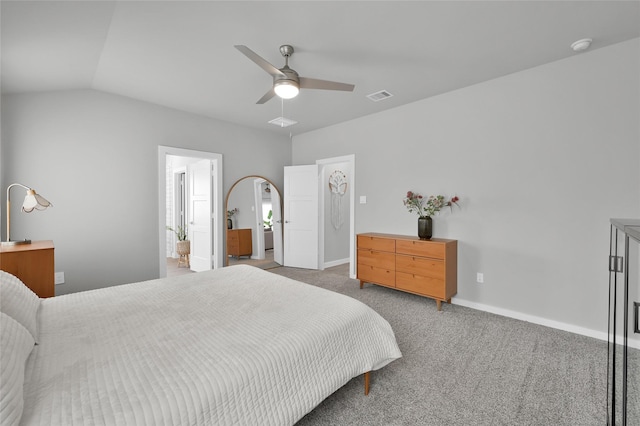 carpeted bedroom with ceiling fan and vaulted ceiling