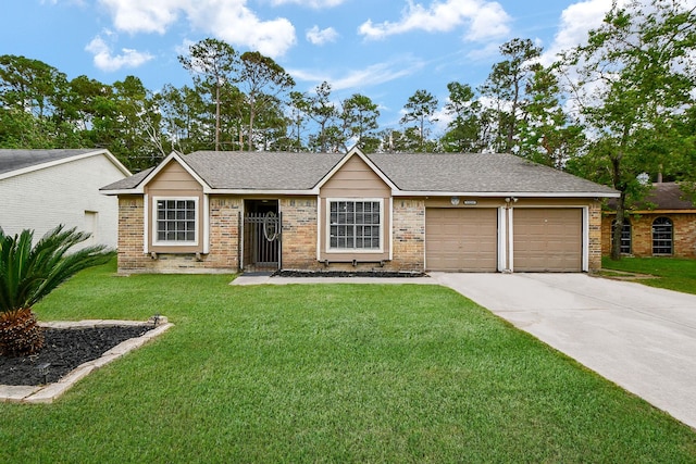 ranch-style home featuring a garage, brick siding, driveway, and a front lawn