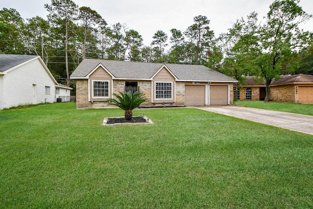 ranch-style home featuring a garage and a front yard