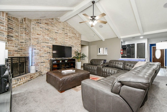 living room with carpet, beam ceiling, a brick fireplace, ceiling fan, and high vaulted ceiling