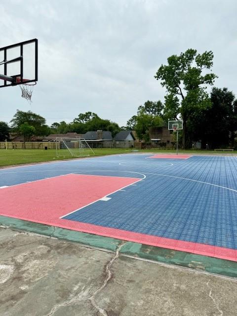 view of sport court with community basketball court