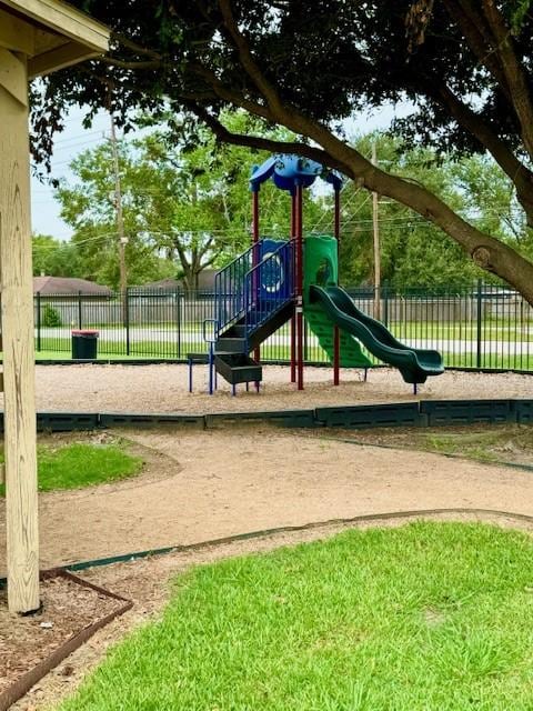 community playground featuring fence