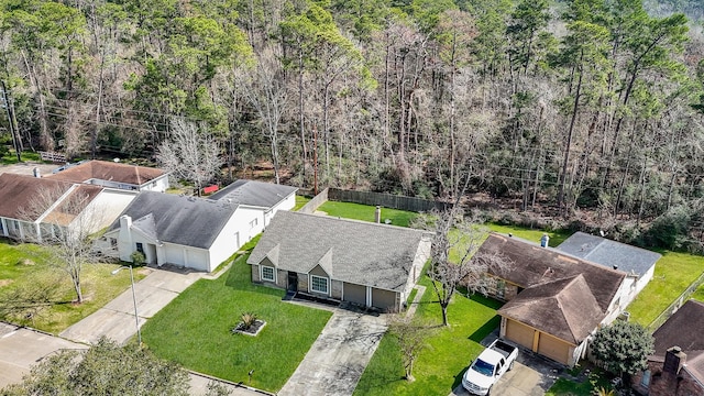 aerial view featuring a view of trees