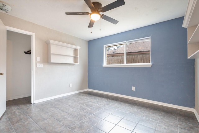 unfurnished room featuring ceiling fan