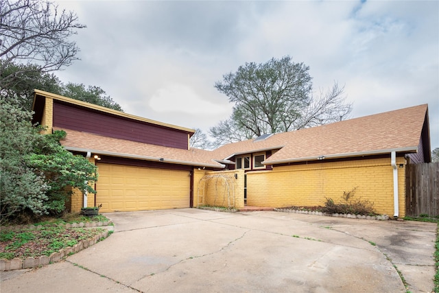 view of front of home featuring a garage