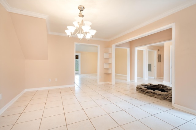 unfurnished room with crown molding, light tile patterned floors, and a chandelier