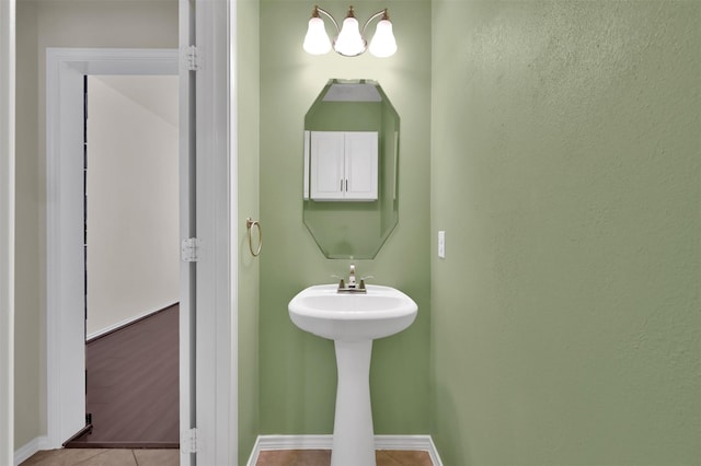 bathroom with tile patterned flooring