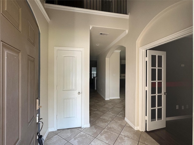 entrance foyer with light tile patterned flooring