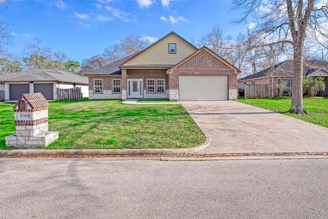 view of front property featuring a garage and a front lawn