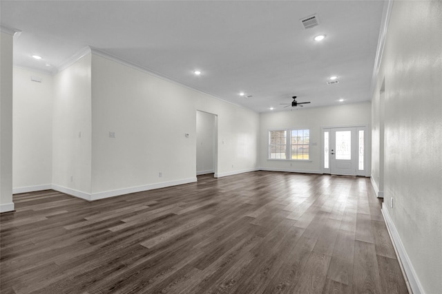 unfurnished room featuring ceiling fan, ornamental molding, and dark hardwood / wood-style flooring