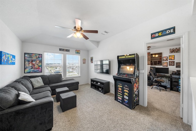 carpeted living room with ceiling fan