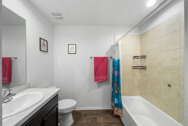 full bathroom with shower / bath combo with shower curtain, wood-type flooring, toilet, and vanity