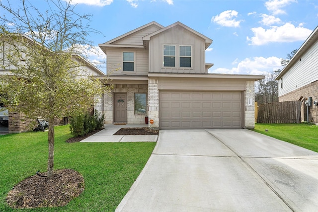 view of front of house featuring a garage and a front yard