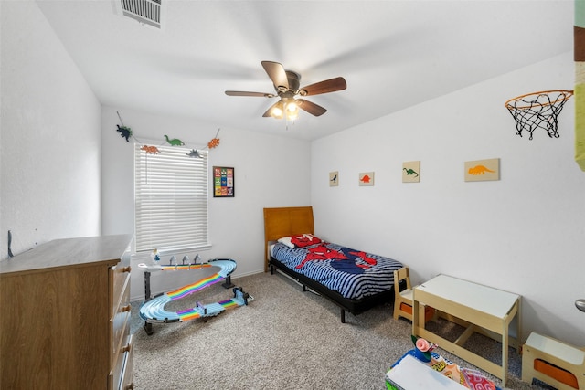 bedroom featuring ceiling fan and light colored carpet