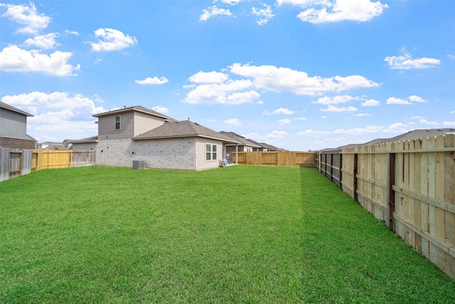 view of yard with central AC